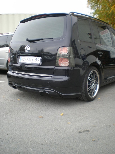 rajout spoiler, feux leds, jantes vertini, aileron....